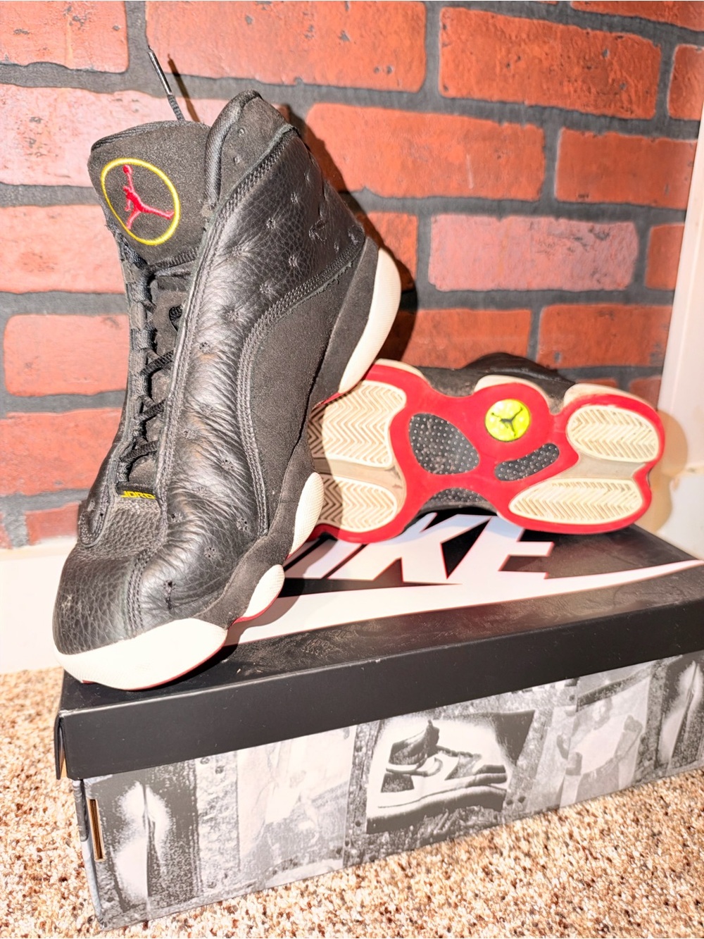 Jordan Black Leather High-Top Sneakers with Red and Yellow Accents
